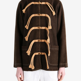 Brown jacket worn by a person, showing the jacket fit