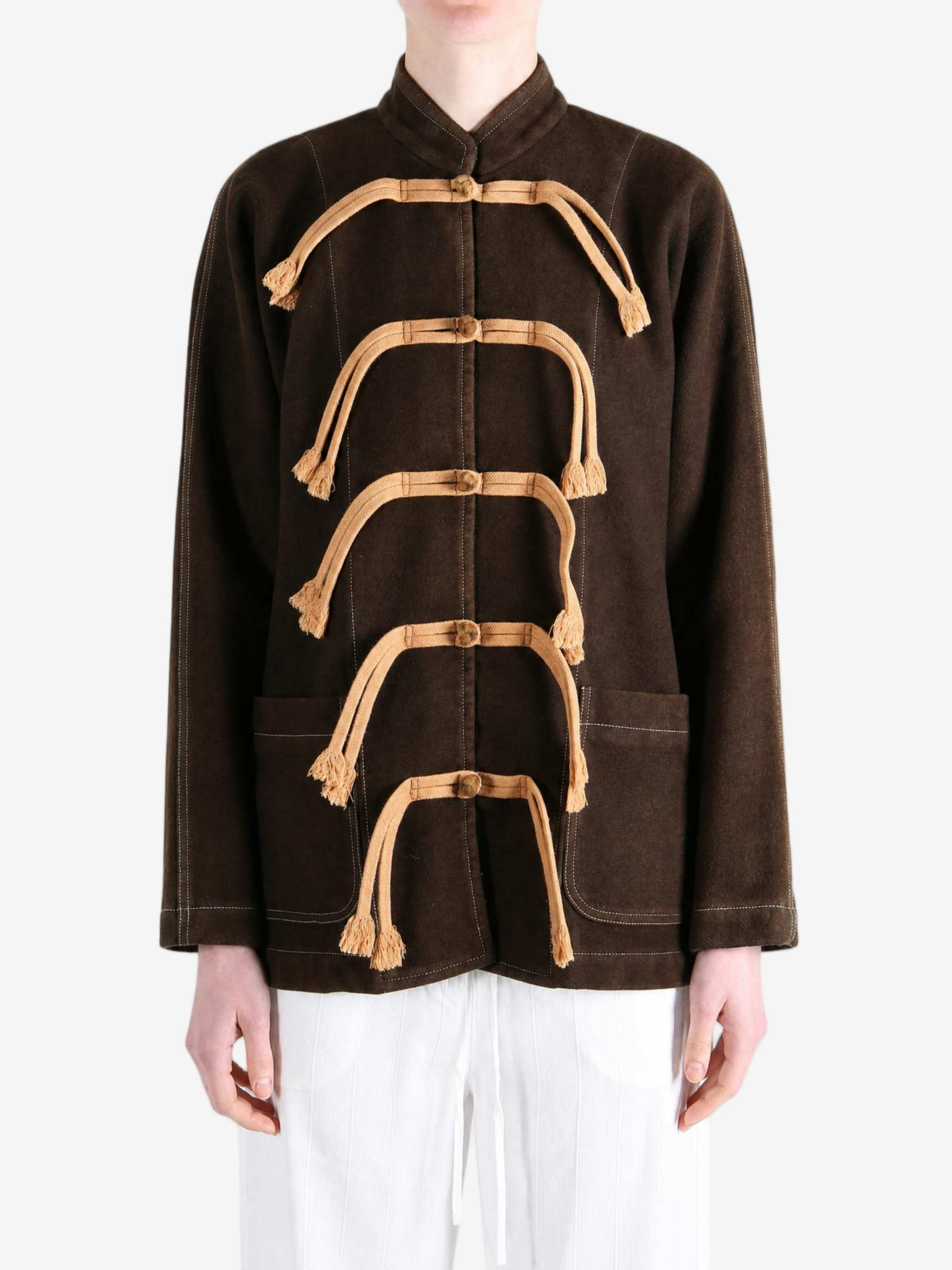 Brown jacket worn by a person, showing the jacket fit