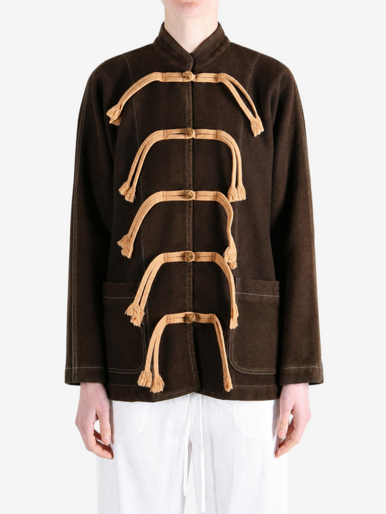 Brown jacket worn by a person, showing the jacket fit