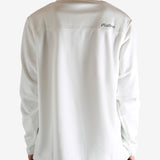 White sweatshirt worn by a person, showing the sweatshirt's fit