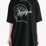 Black t-shirt worn by a person, showing the t-shirt's fit