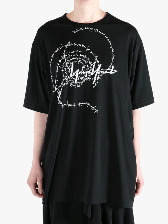 Black t-shirt worn by a person, showing the t-shirt's fit