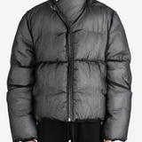 Black jacket worn by a person, showing the jacket fit