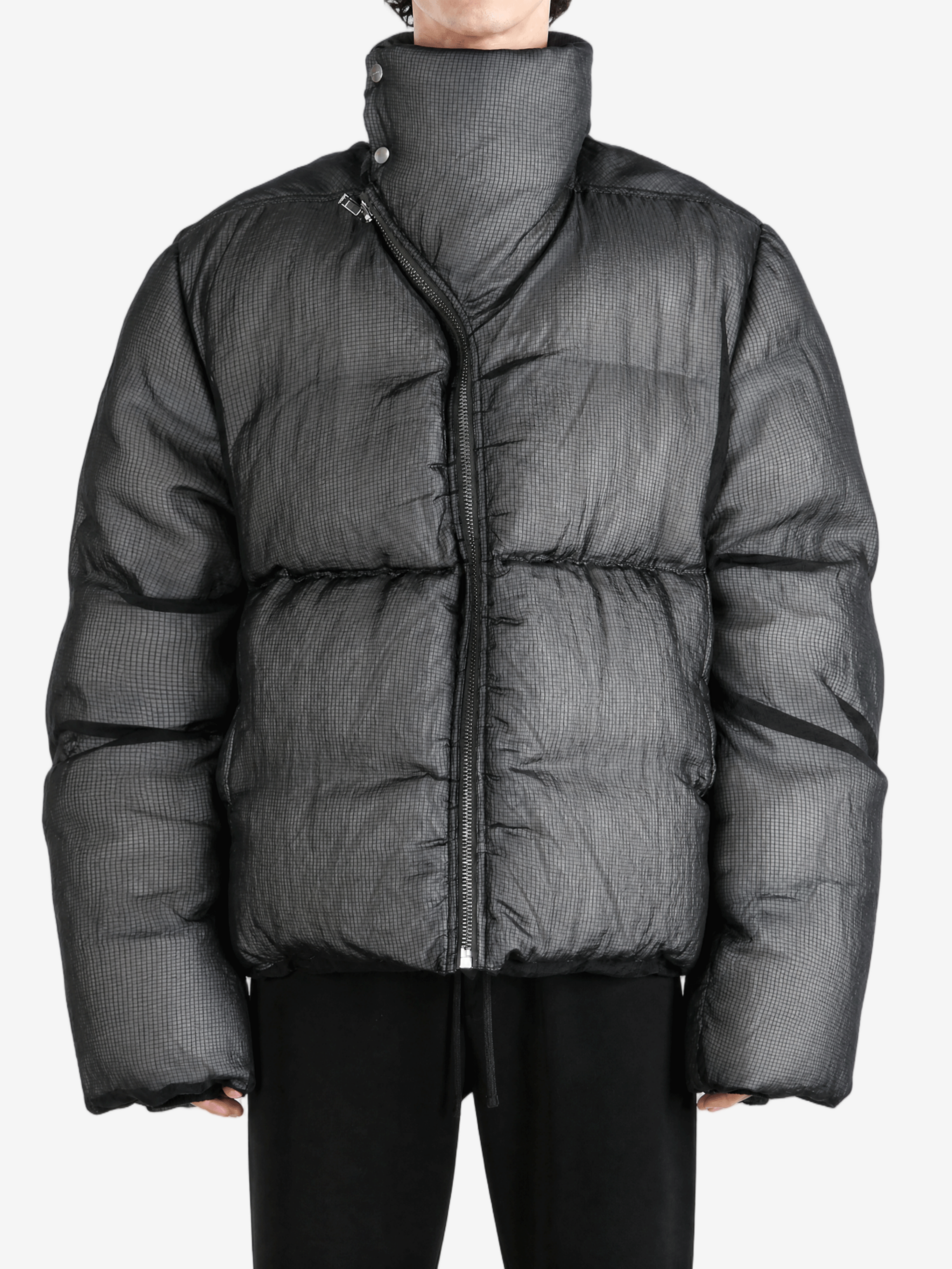 Black jacket worn by a person, showing the jacket fit