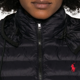 Close up of the black jacket, showing texture of the polyester fabric