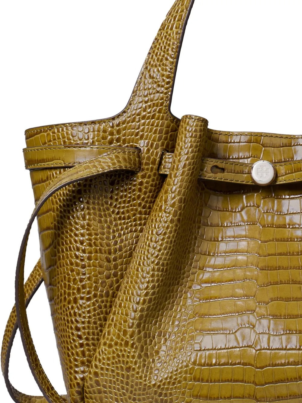 Close up of green bags, showing texture of the crocodile embossed leather fabric