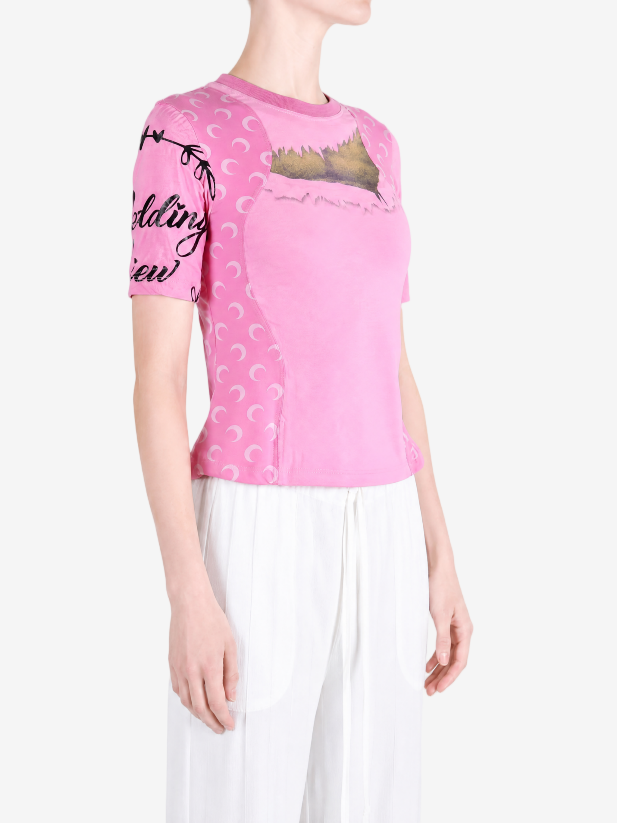 Pink t-shirt worn by a person, showing the t-shirt fit