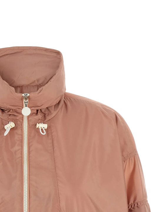 Close up of pink jacket, showing the detail of the collar