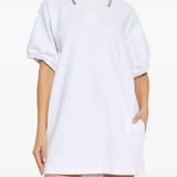 white dress,worn by a person,showing the dress fit