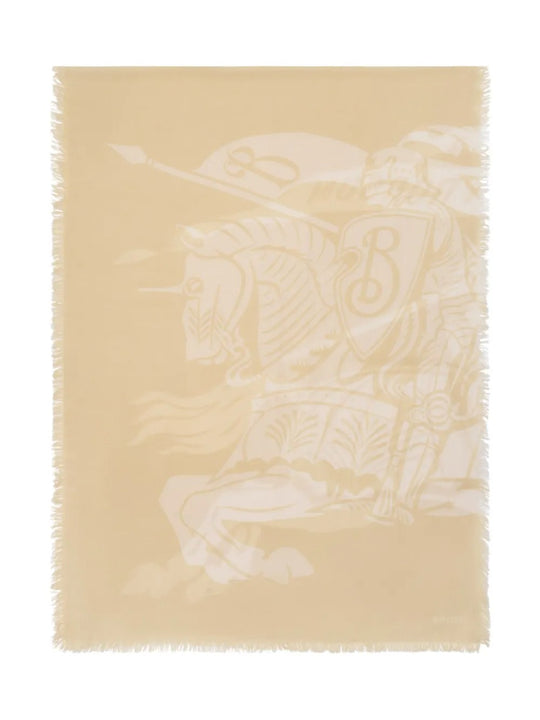 Close up of tan scarf, showing texture of the wool fabric