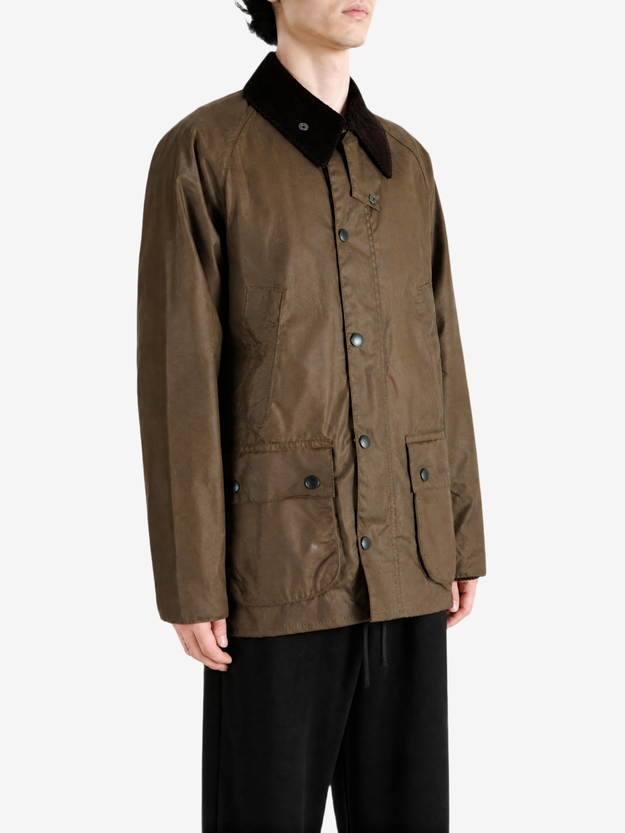 Brown jacket worn by a person, showing the jacket fit