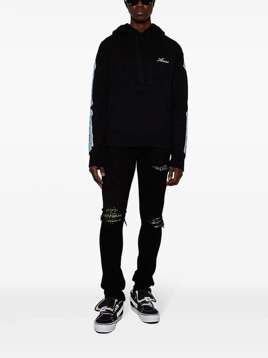Black knitwear, full body view