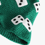 Close up of green hat,showing texture of the knit acrylic fabric