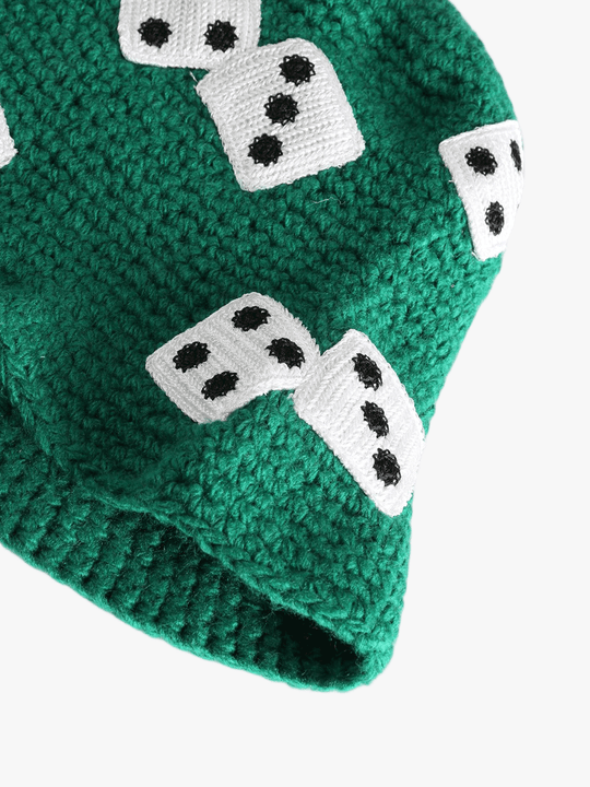 Close up of green hat,showing texture of the knit acrylic fabric