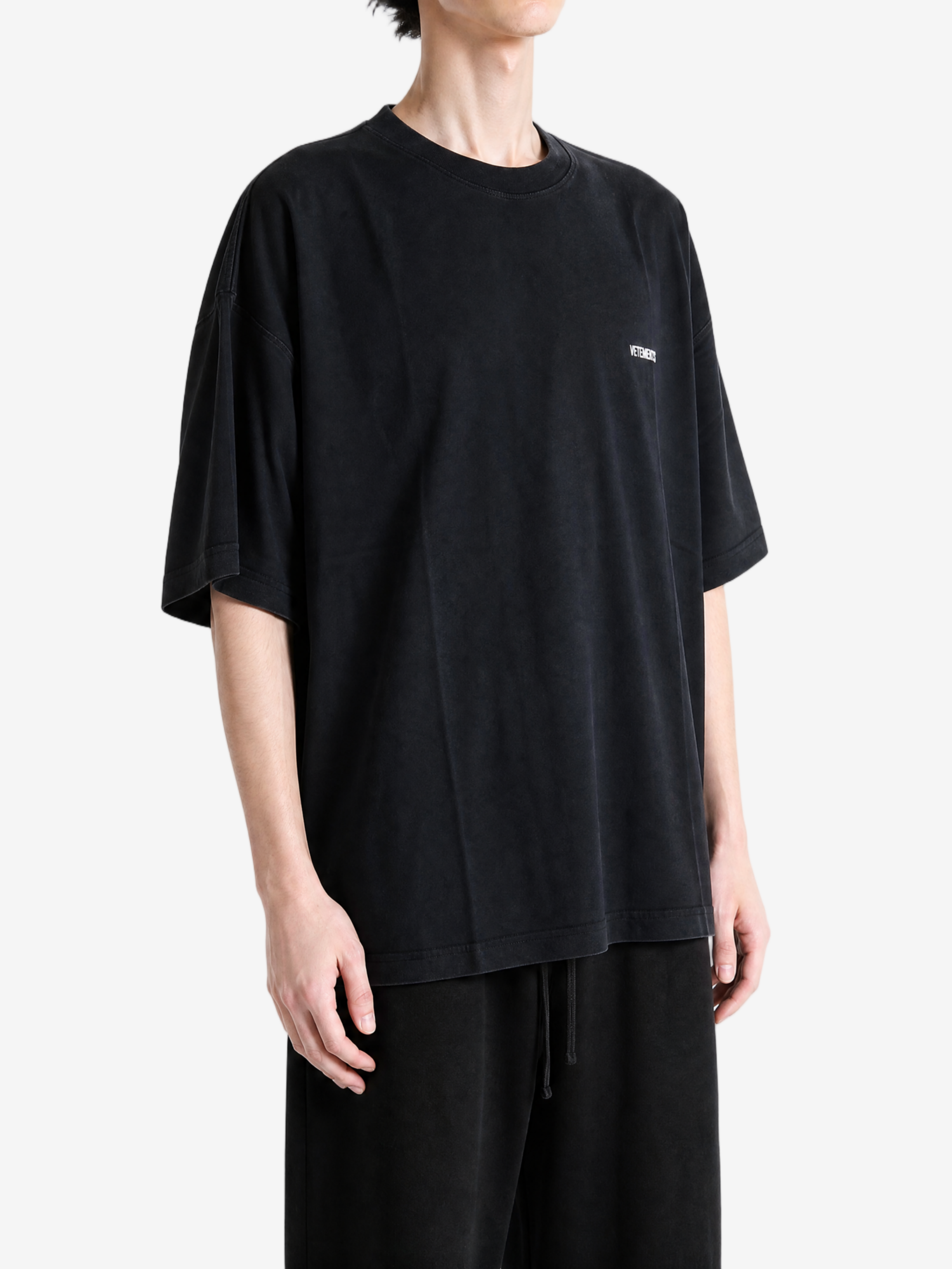 Black t-shirt, full body view