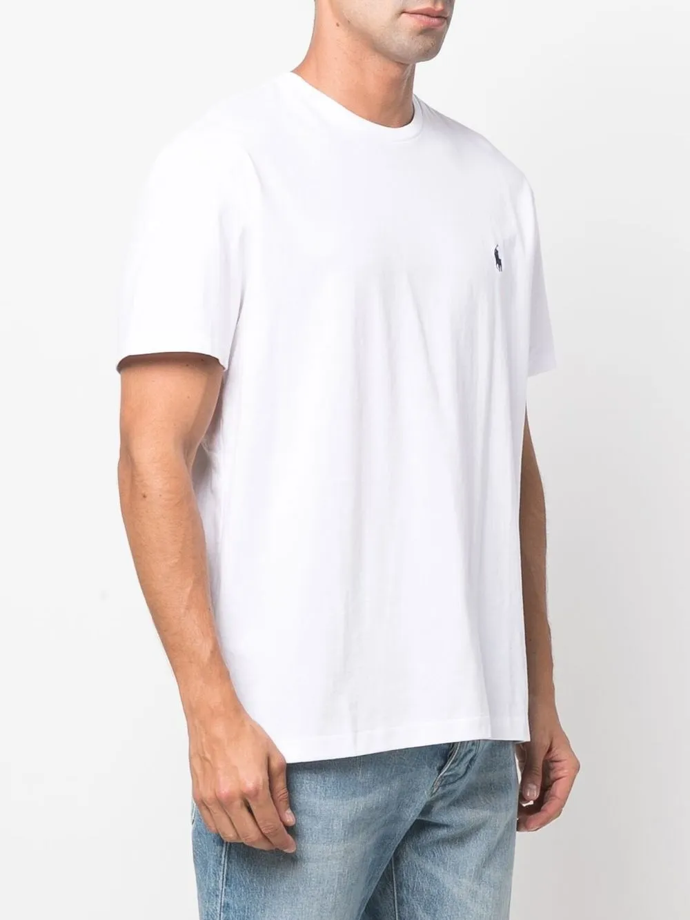 White shirt worn by a person,showing the shirt's fit
