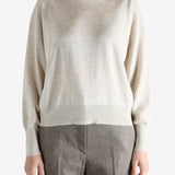 Grey knitwear worn by a person, showing the knitwear fit