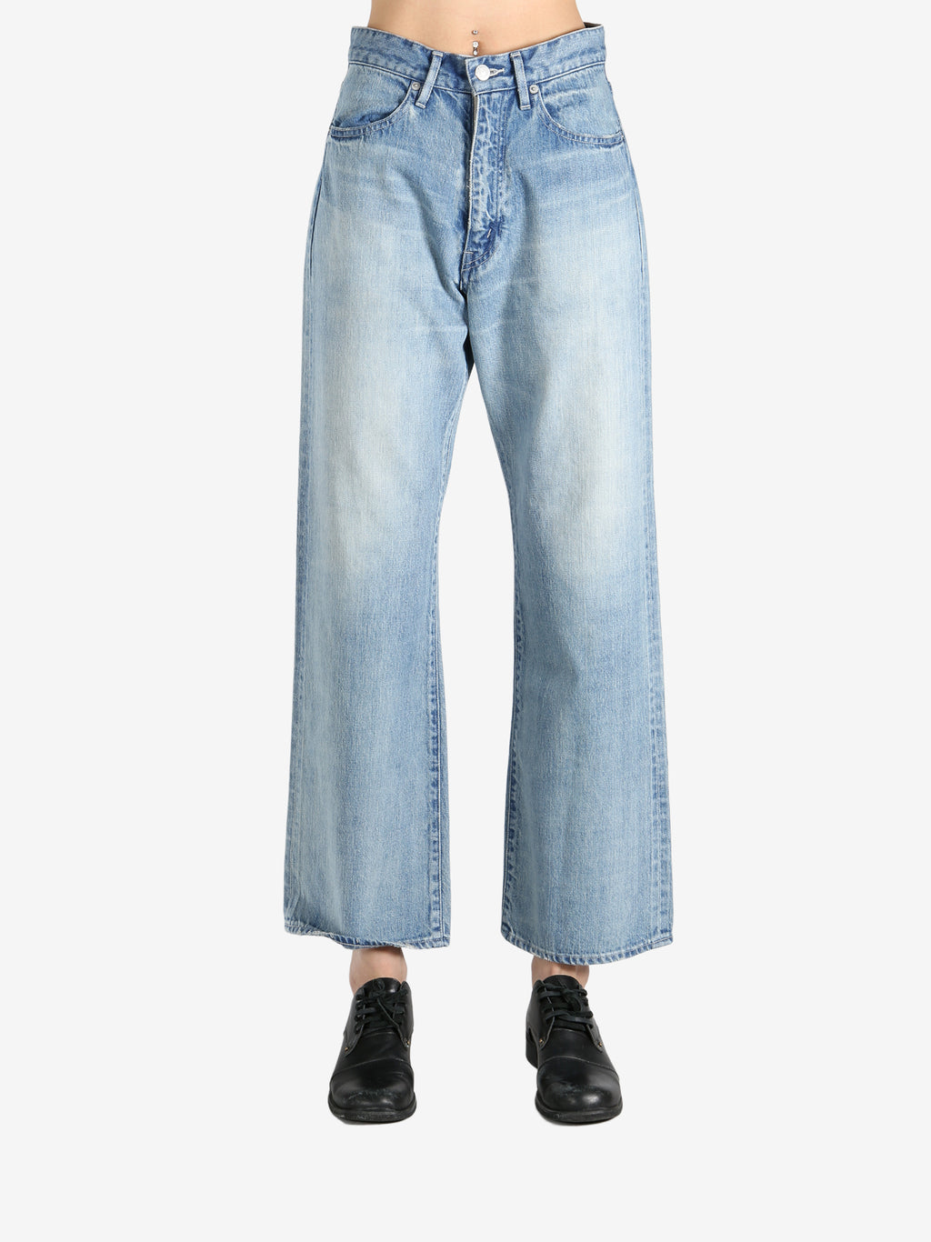 Blue pant worn by a person, showing the pant's fit