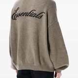 brown sweater worn by a person, showing the sweater fit