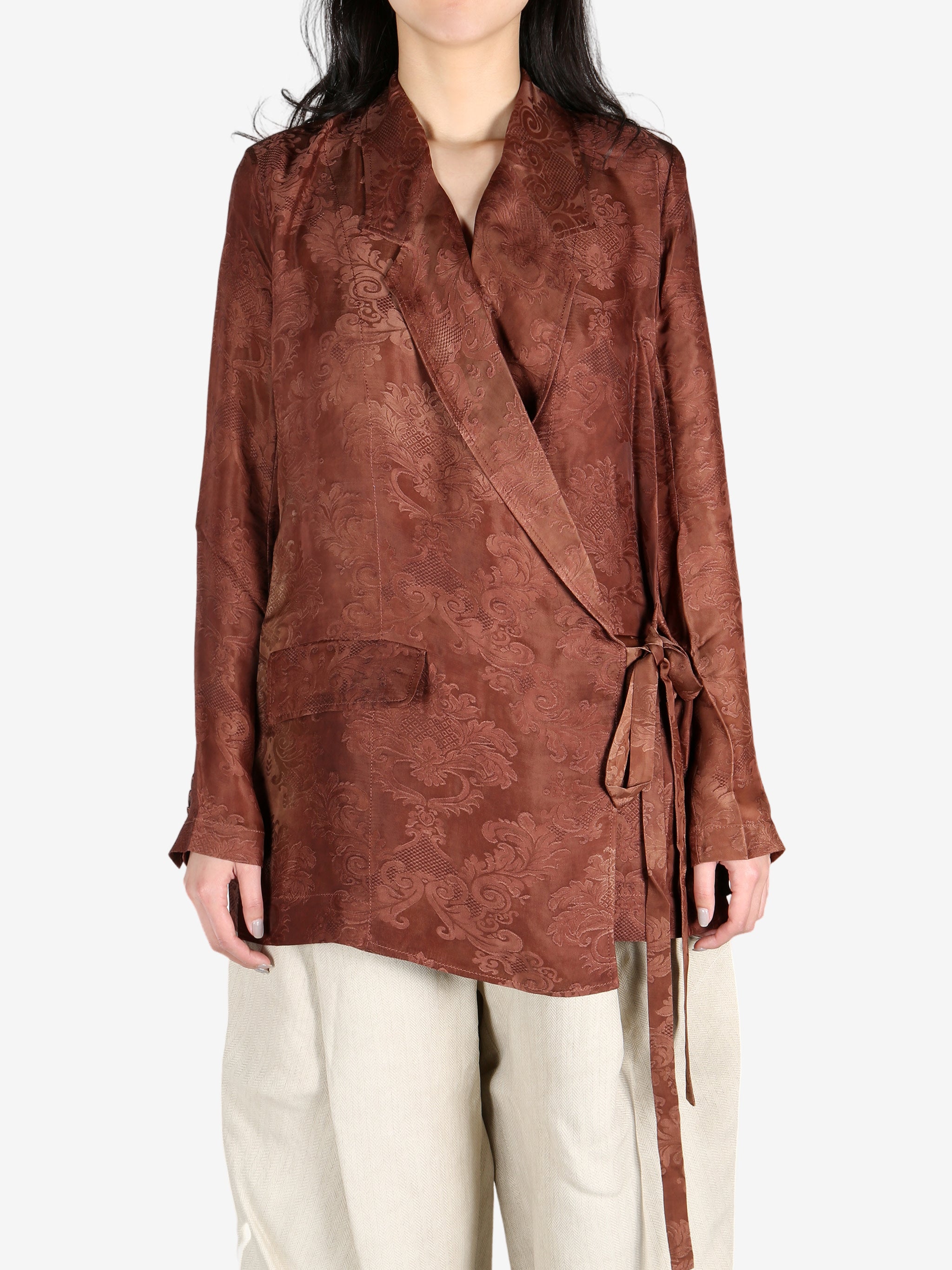 Red jacket worn by a person, showing the jacket's fit