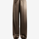 Brown pants worn by a person, showing the pants's fit