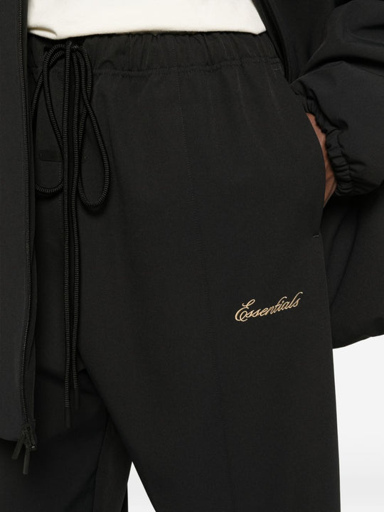 Close up of black pants, showing texture of the cotton fabric