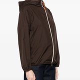 Brown jacket worn by a person, showing the jacket's fit