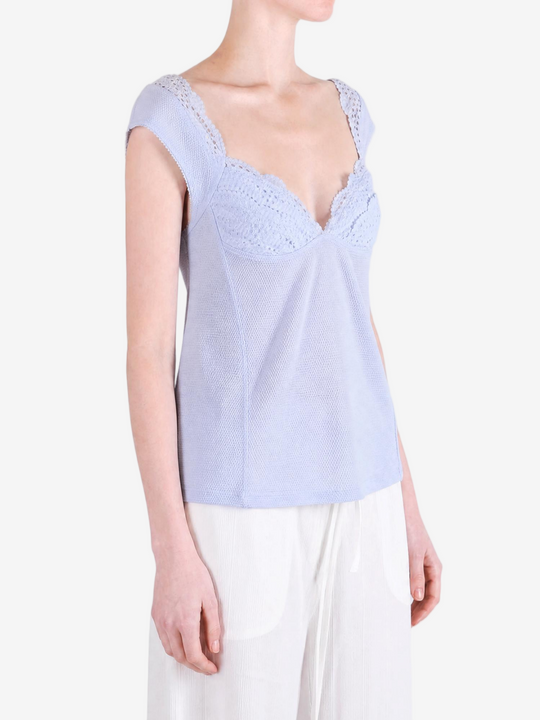 Blue t-shirt worn by a person, showing the t-shirt fit