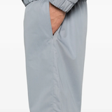 Close up of grey shorts, showing texture of the Cotton fabric