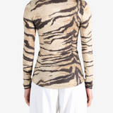 Tan shirt worn by a person, showing the shirt fit