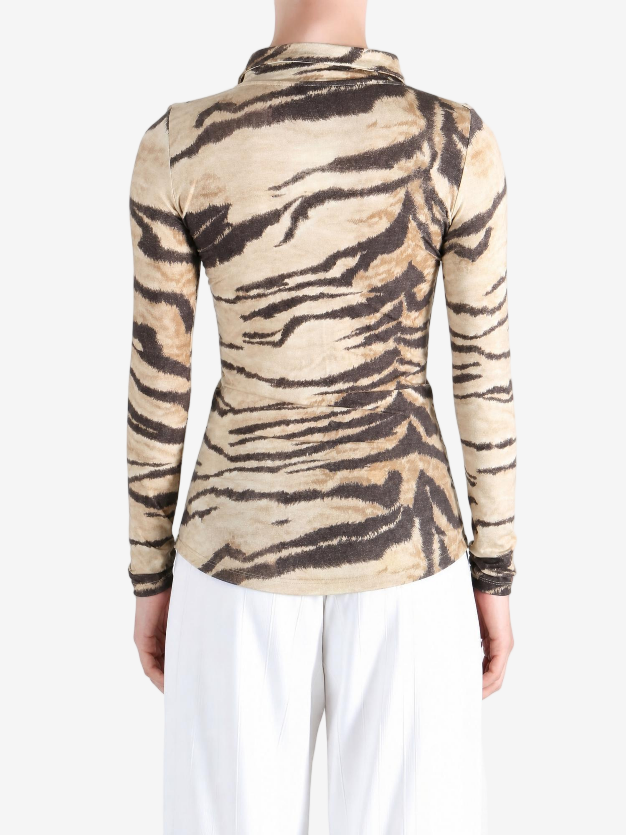 Tan shirt worn by a person, showing the shirt fit