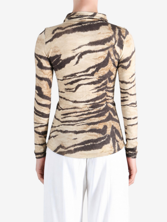 Tan shirt worn by a person, showing the shirt fit