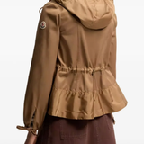 Brown jackets-coats worn by a person, showing the jackets-coats's fit