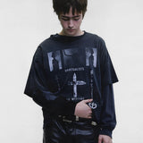Black t-shirt worn by a person, showing the t-shirt fit