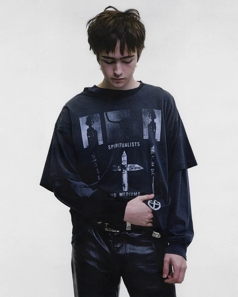 Black t-shirt worn by a person, showing the t-shirt fit