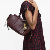 Burgundy bag, full body view