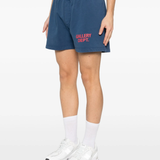 Blue shorts worn by a person, showing the pants's fit