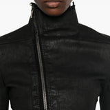 Black jacket worn by a person, showing the jacket fit