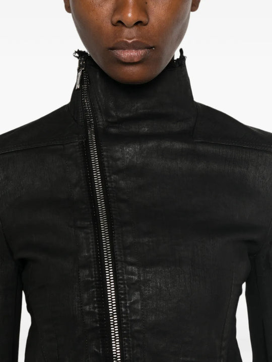 Black jacket worn by a person, showing the jacket fit