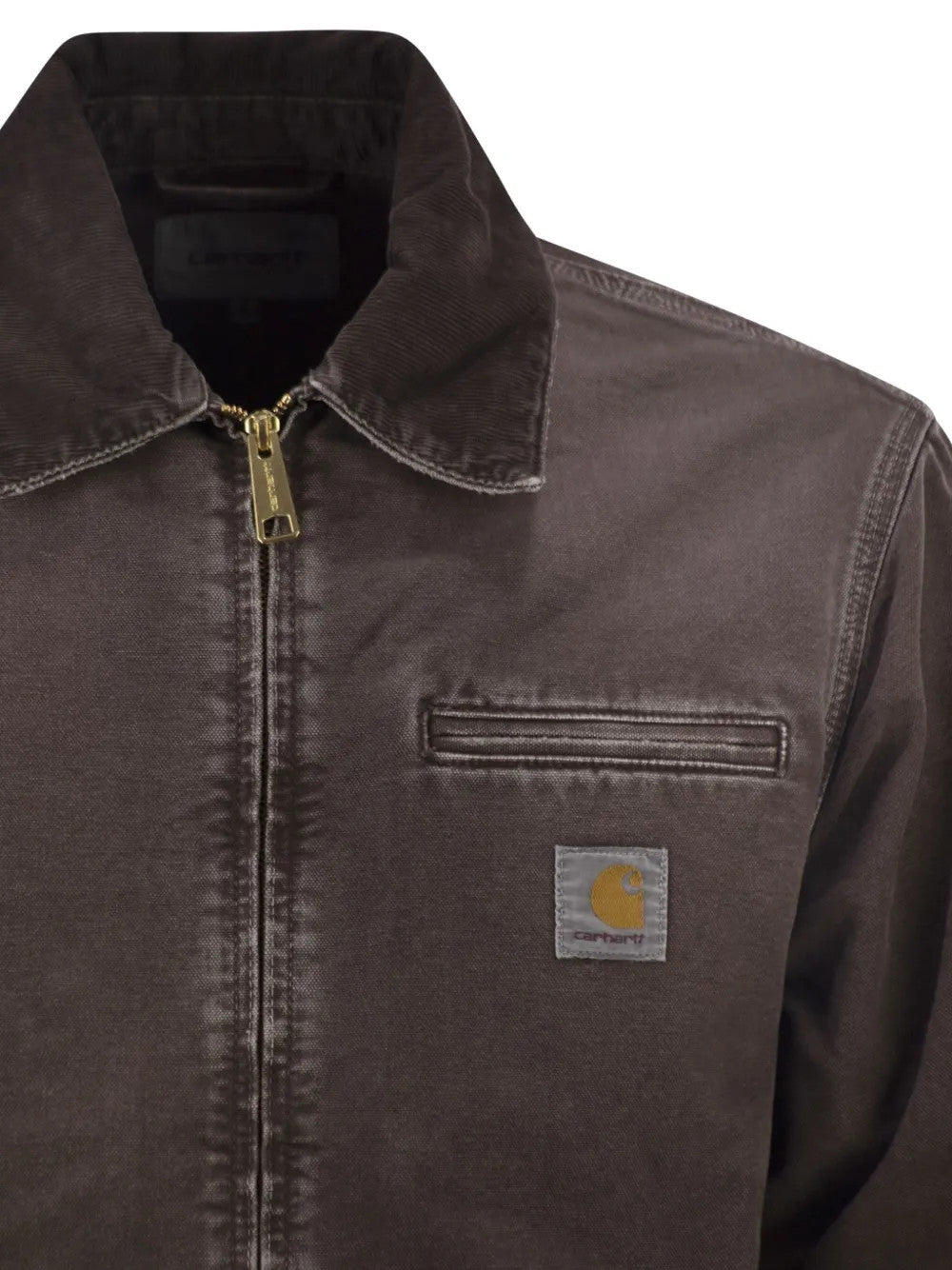 Close up of Brown jacket, showing texture of the 100% cotton fabric