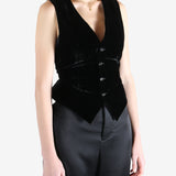 Black coat worn by a person, showing the coat's fit