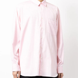 Pink shirt worn by a person, showing the shirt fit