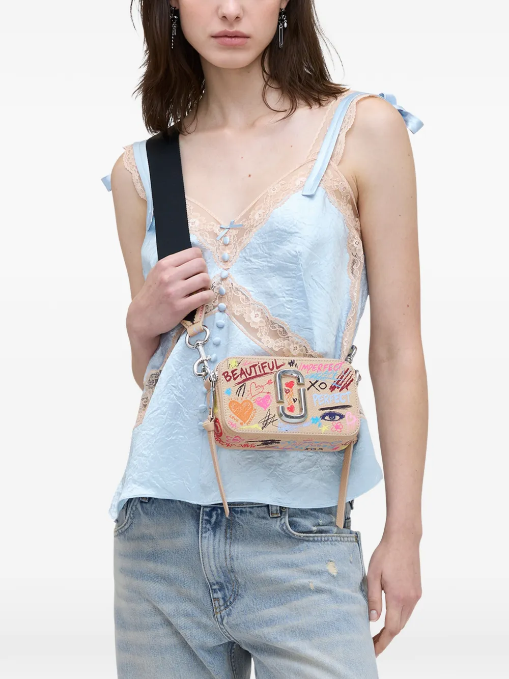 white bags worn by a person, showing the bags fit