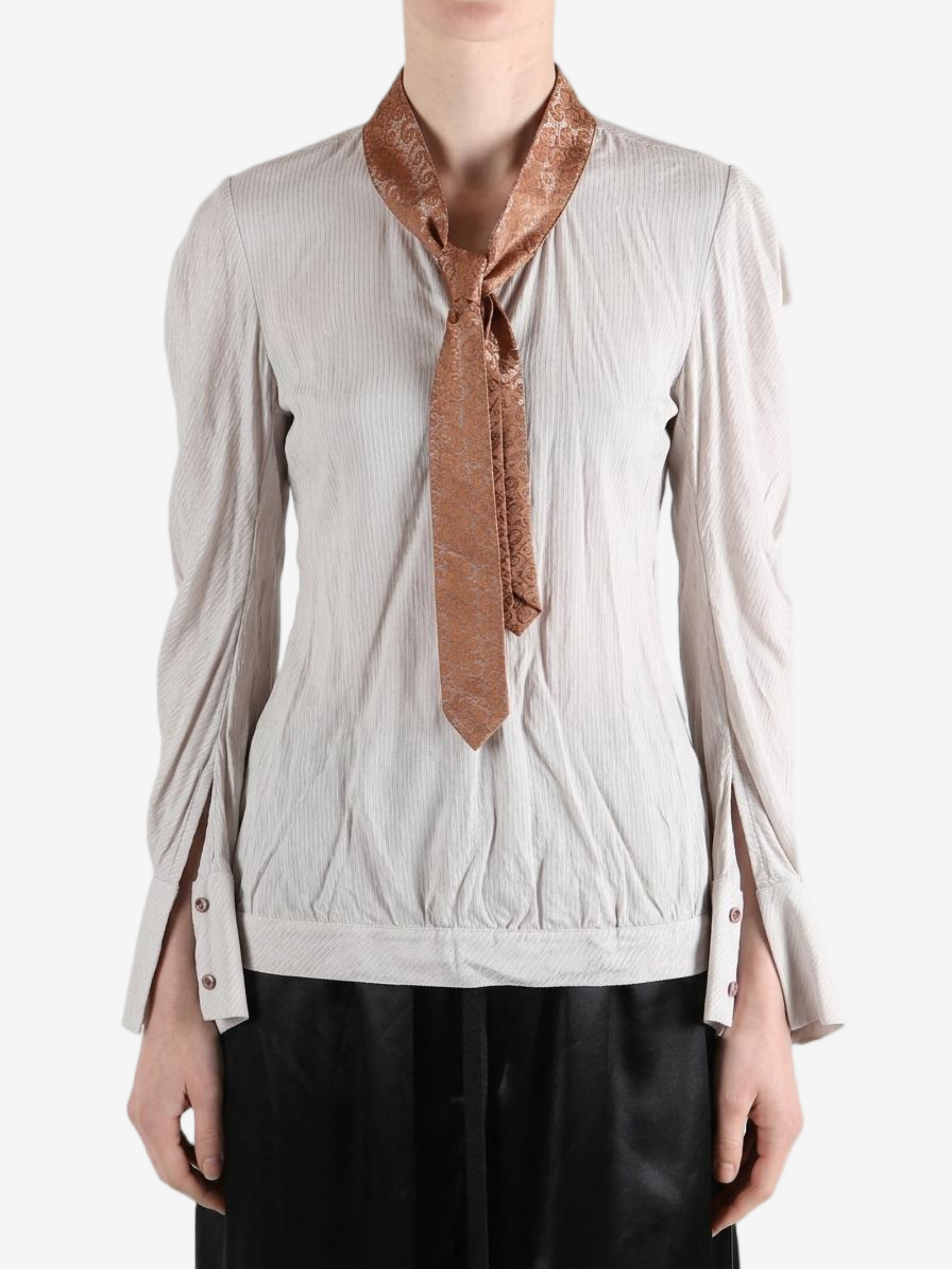 white top worn by a person, showing the top fit