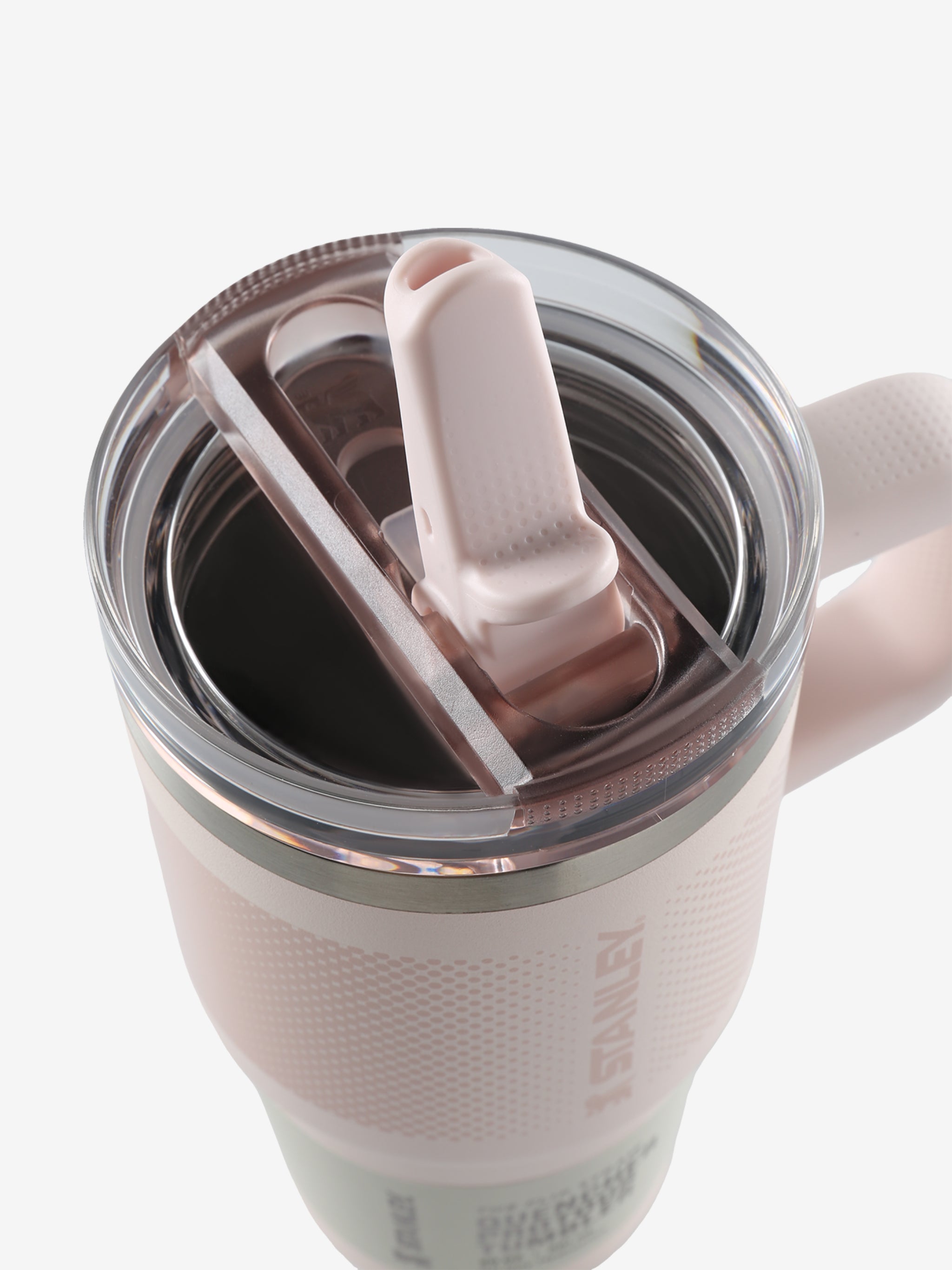 Close up of pink cup, showing texture of the stainless steel fabric