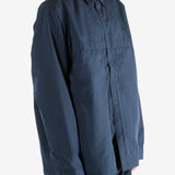 Navy jacket worn by a person, showing the jacket's fit