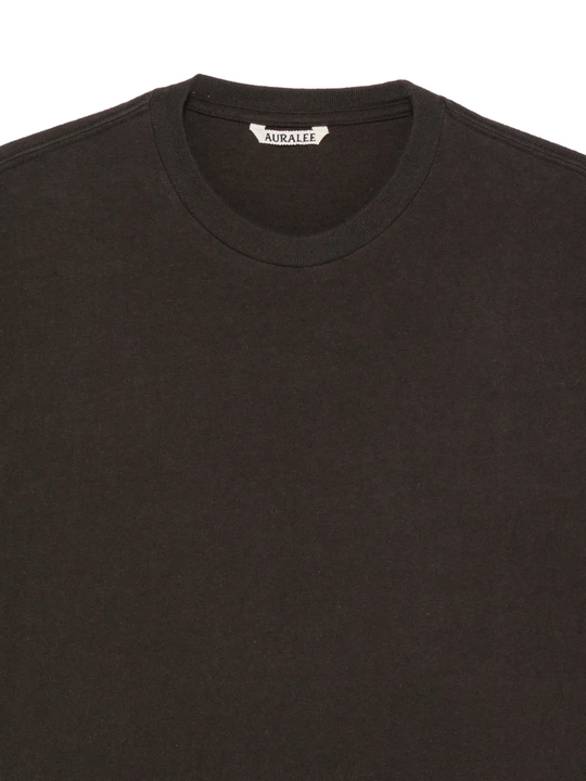 Close up of Black t-shirt, showing texture of the cotton fabric