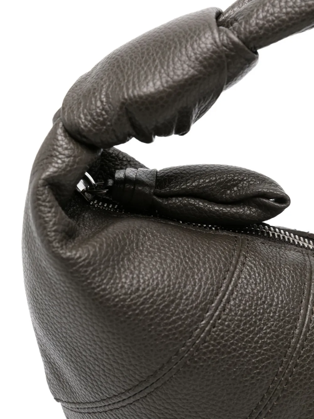 Close up of the black bag, showing texture of the leather fabric