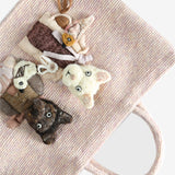 Close up of white bag,showing texture of the wool fabric