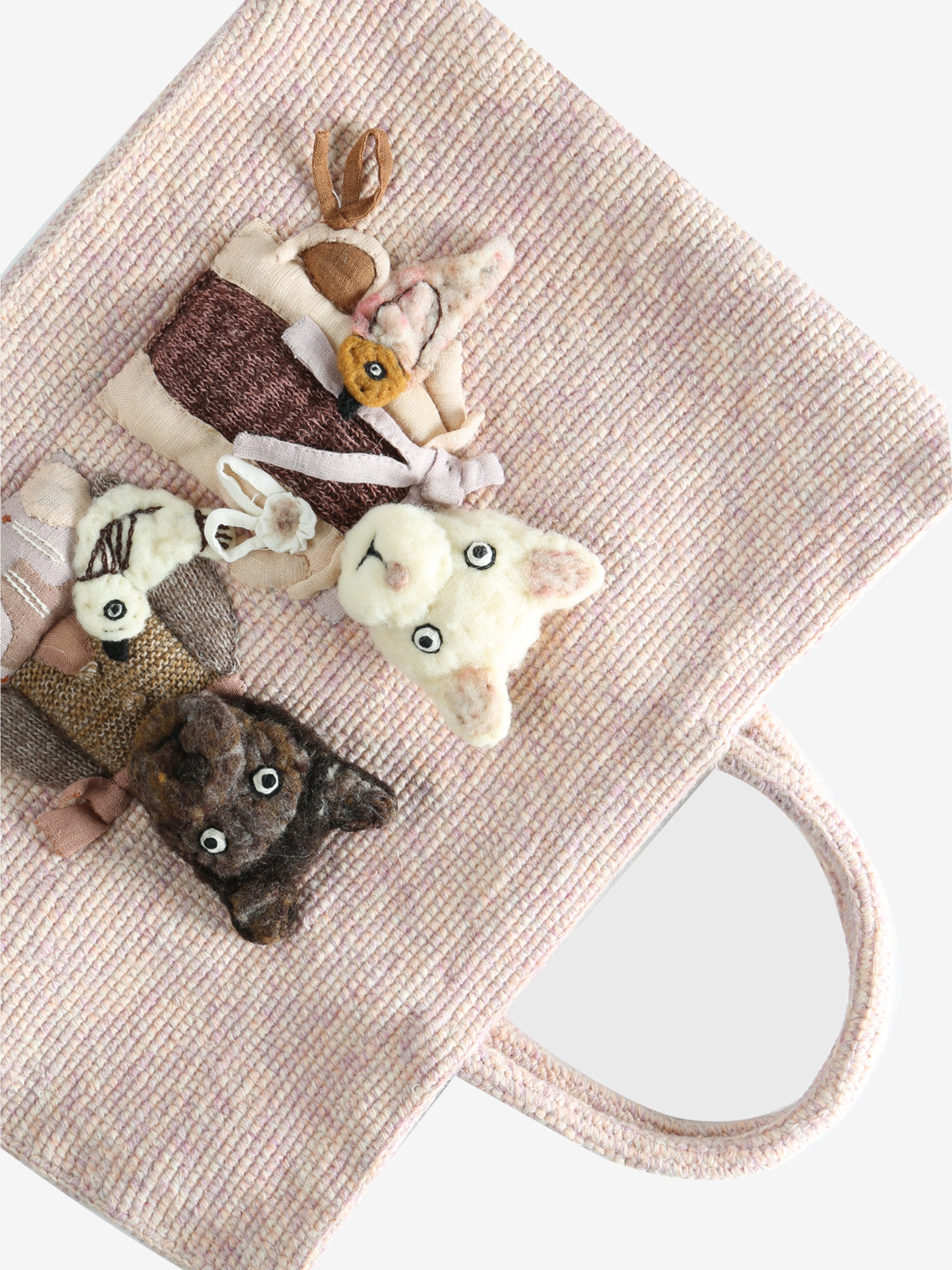 Close up of white bag,showing texture of the wool fabric